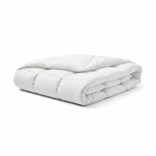 White lightweight hotel duvet insert slightly unfolded showing box-stitch quilting pattern and thin airy lightweight profile on white background, warm climate commercial hospitality guestroom bedding insert