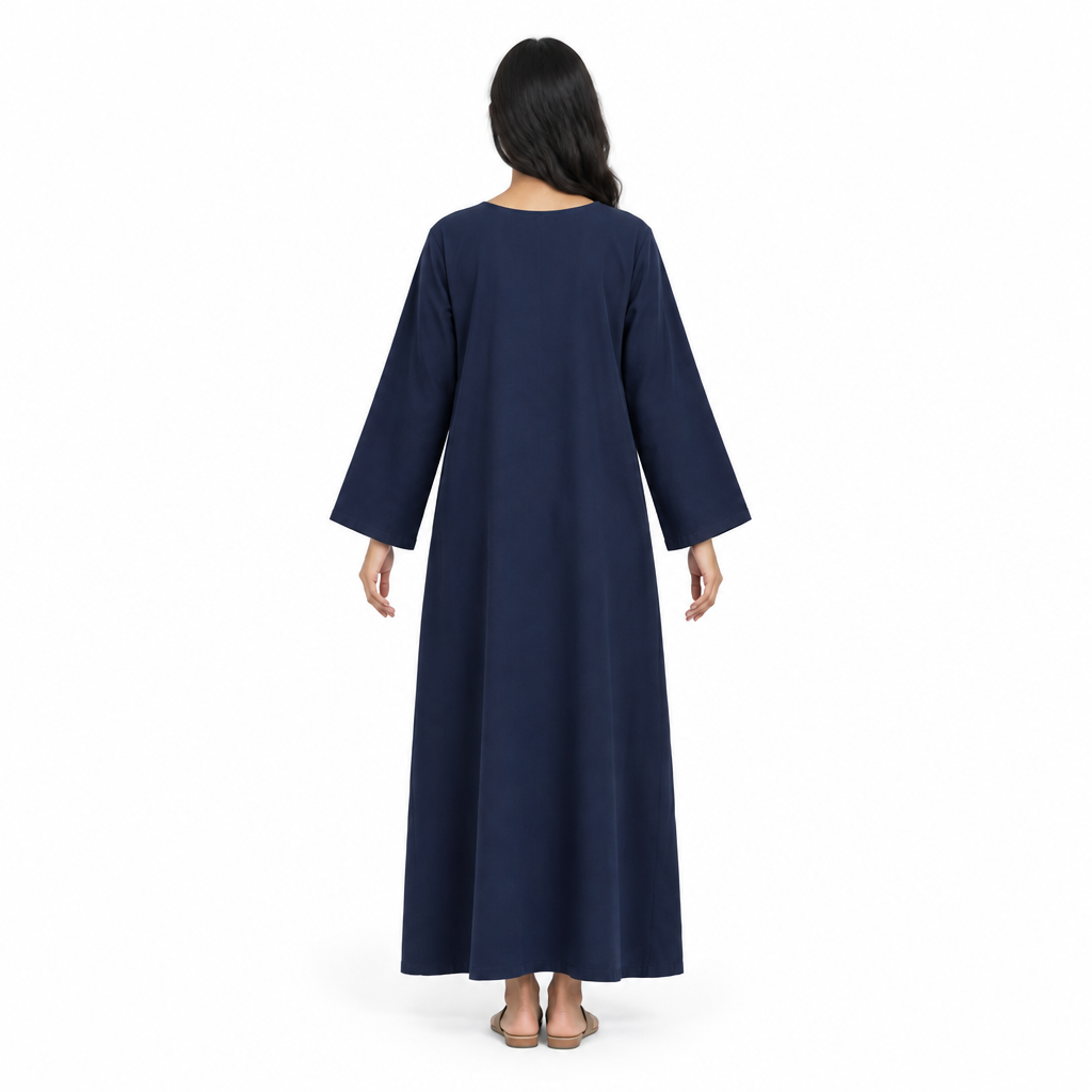 Back view of model wearing a plain navy long-sleeve full-length loose kaftan dress on a white background