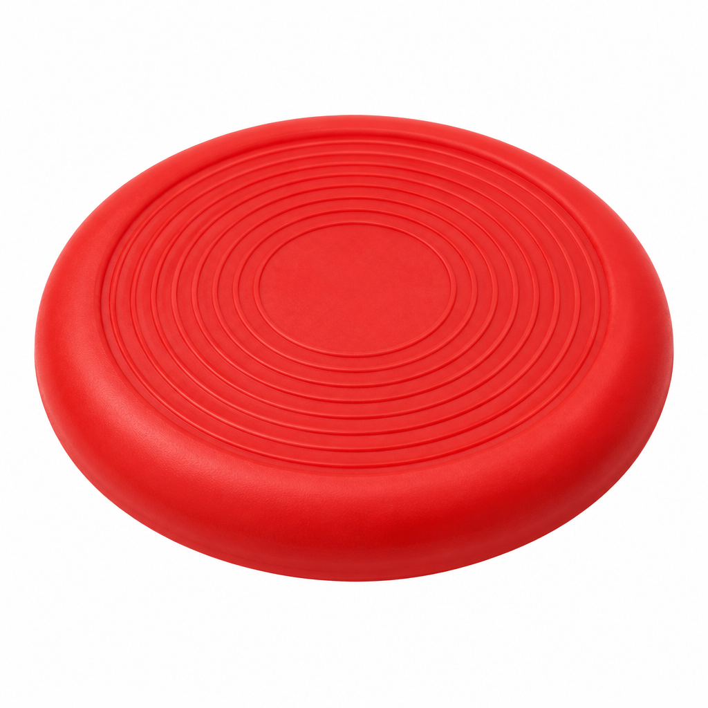 Flexible natural rubber dog flying disc with aerodynamic raised rim and concentric grip ridges on pure white background