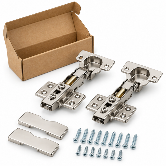 Pair of nickel-plated 35mm cup concealed soft-close cabinet hinges with clip-on mounting plates and installation screws on a pure white background
