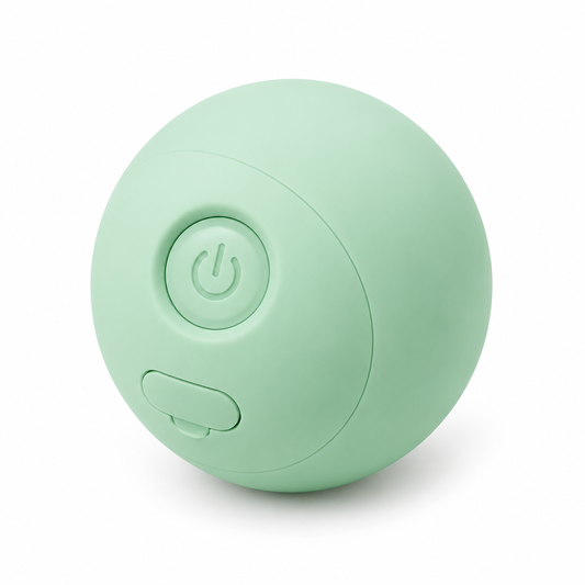 Smart automatic rolling cat toy ball with mint green silicone shell, power button, and charging flap on pure white background