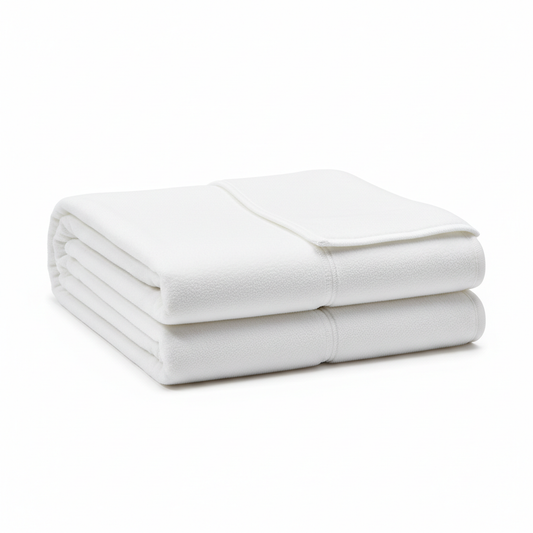 White soft polyester fleece hotel blanket neatly folded showing plush fleece surface texture and overlock edge finish on white background, commercial hospitality guestroom supplementary warmth blanket