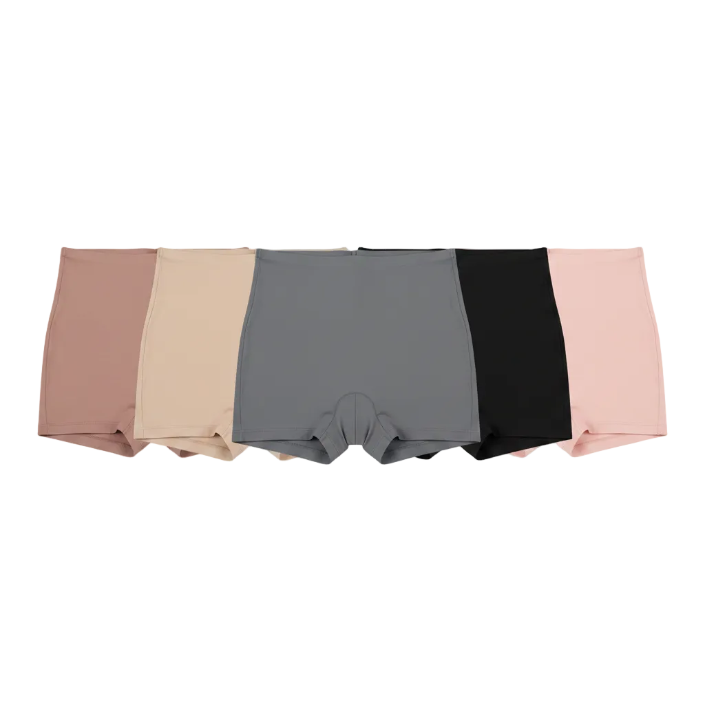 Multi-color flat lay of shaping shorts in five solid colors side-by-side
