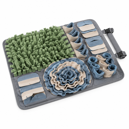 Rectangular multi-zone dog snuffle mat with green fleece grass patch and blue treat pockets on pure white background