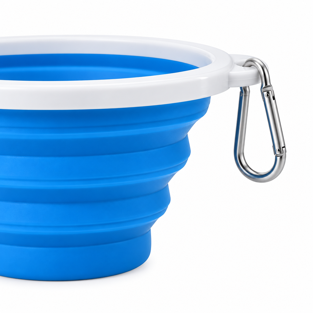 Side view detail of collapsible pet travel bowl showing accordion folding silicone ribs and carabiner clip attachment