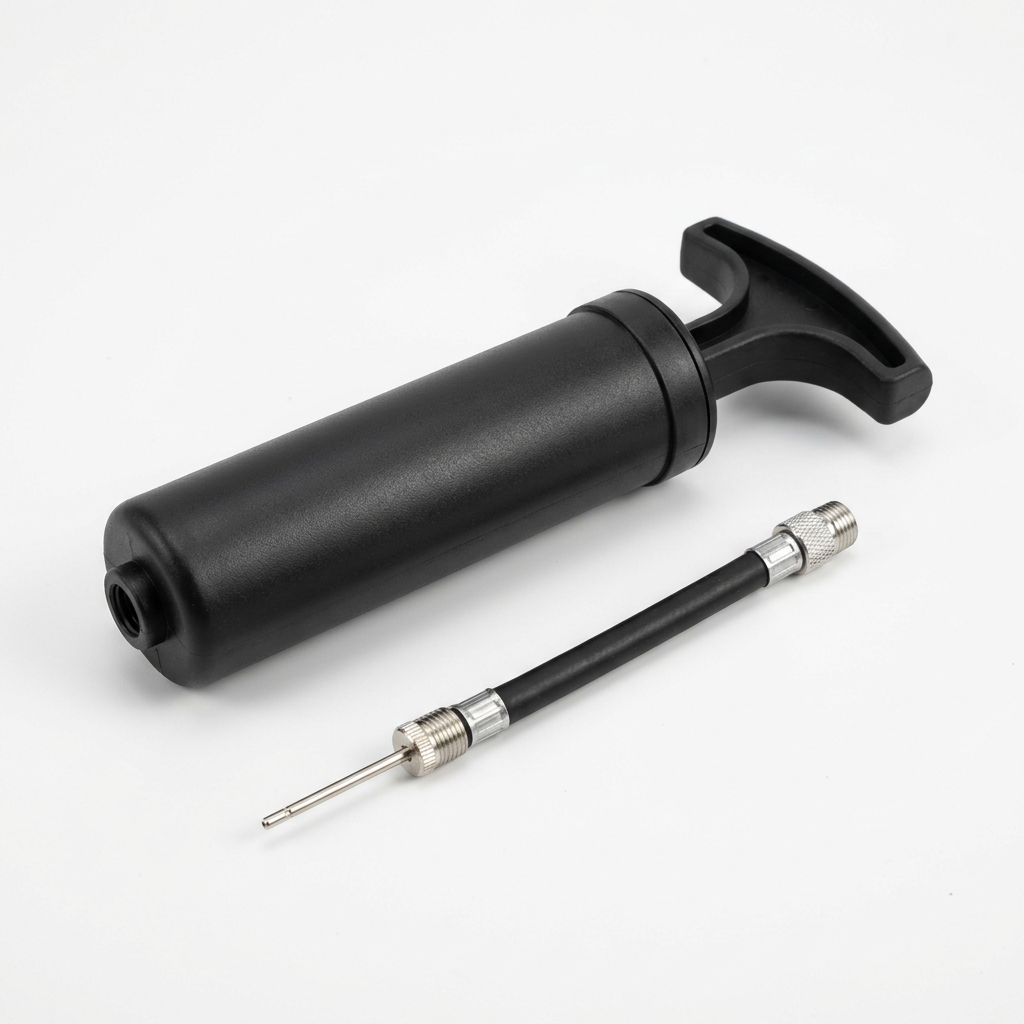Portable manual sports ball pump with its actual hose and inflation needle configuration.