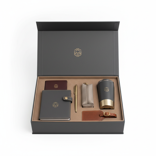 Premium hotel VIP gift set in a charcoal magnetic box with passport holder, notebook, pen, insulated tumbler, travel pouch and luggage tag
