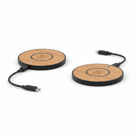 Round bamboo hotel wireless charging pad with black ABS rim, charging ring, status indicator and connected USB-C cable on white background