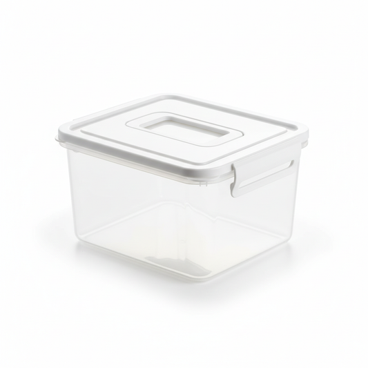 Rectangular clear food storage container with white handle lid on pure white background