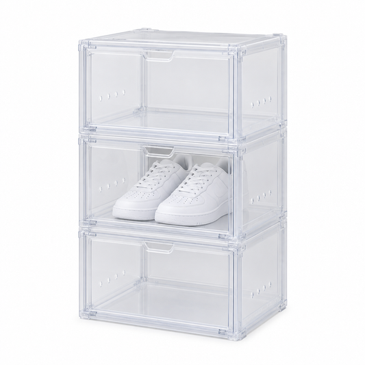 Stackable shoe box, three clear drop-front plastic shoe boxes stacked with sneakers inside on white background