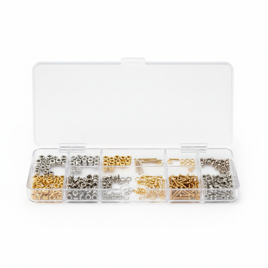 Eyeglass hinge repair screws and parts in transparent compartment tray on white background