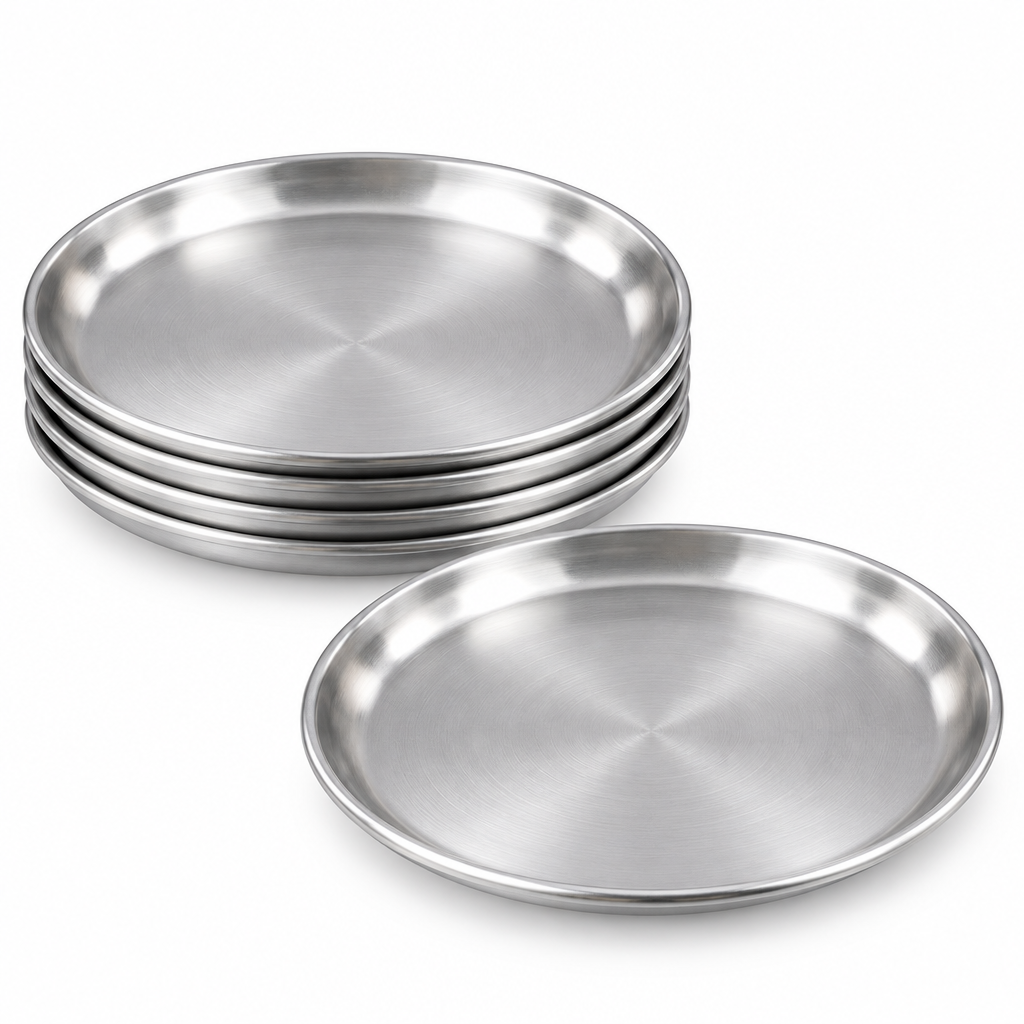 Stack of four stainless steel dinner plates with one plate laid flat showcasing stackable design on a pure white background