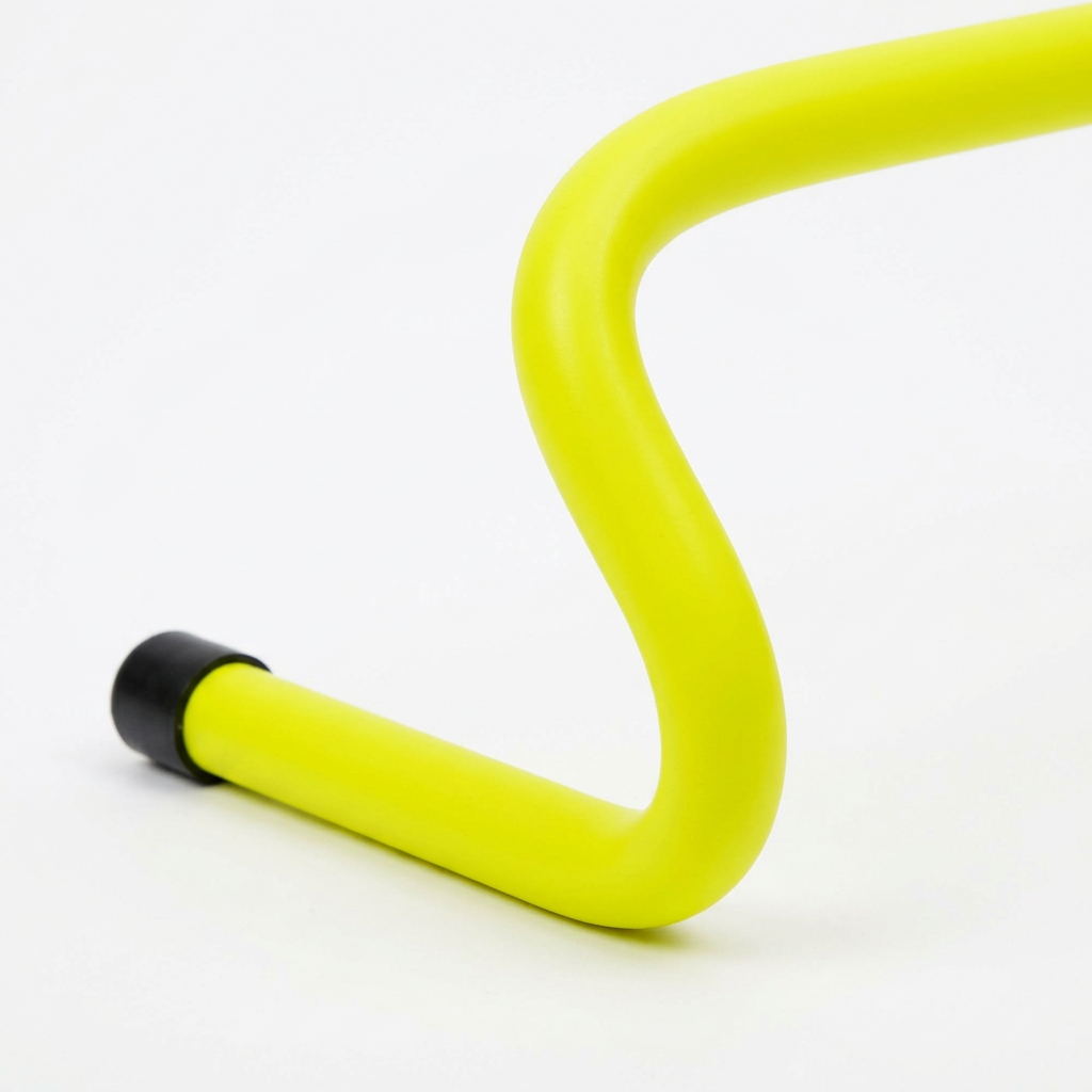 Detail close-up of agility training hurdle curved elbow bend and base foot on white background