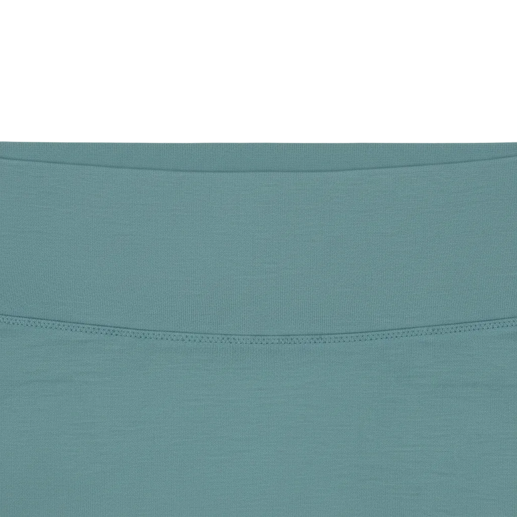 Extreme close-up of smooth fabric-covered gentle waistband and cotton texture