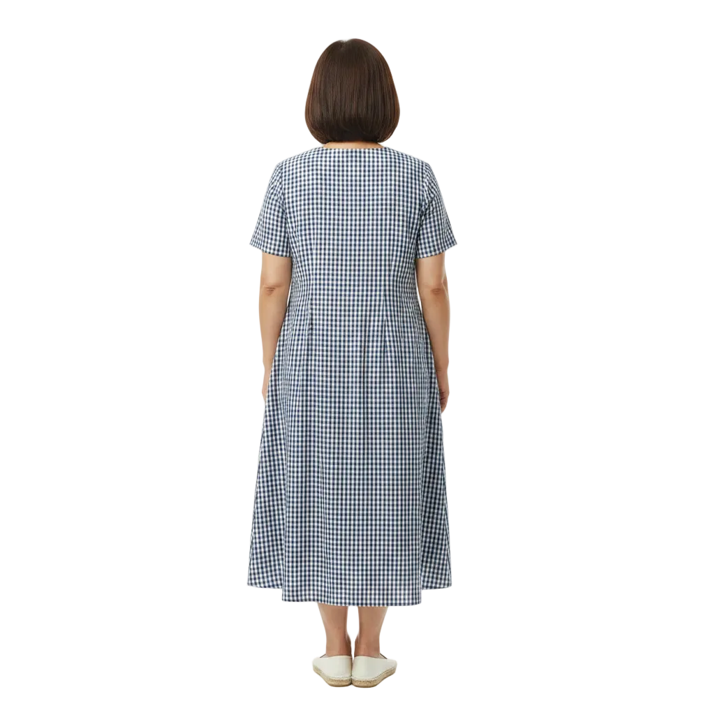 Back view of short sleeve button front midi dress with pockets on white background