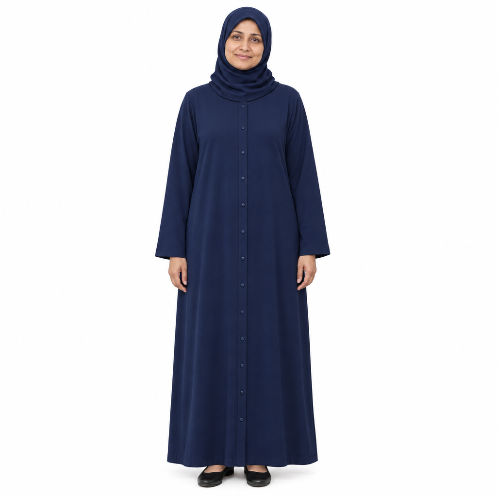 Mature model in a navy hijab wearing a dark navy full-length button front abaya with a center button placket, on a white background