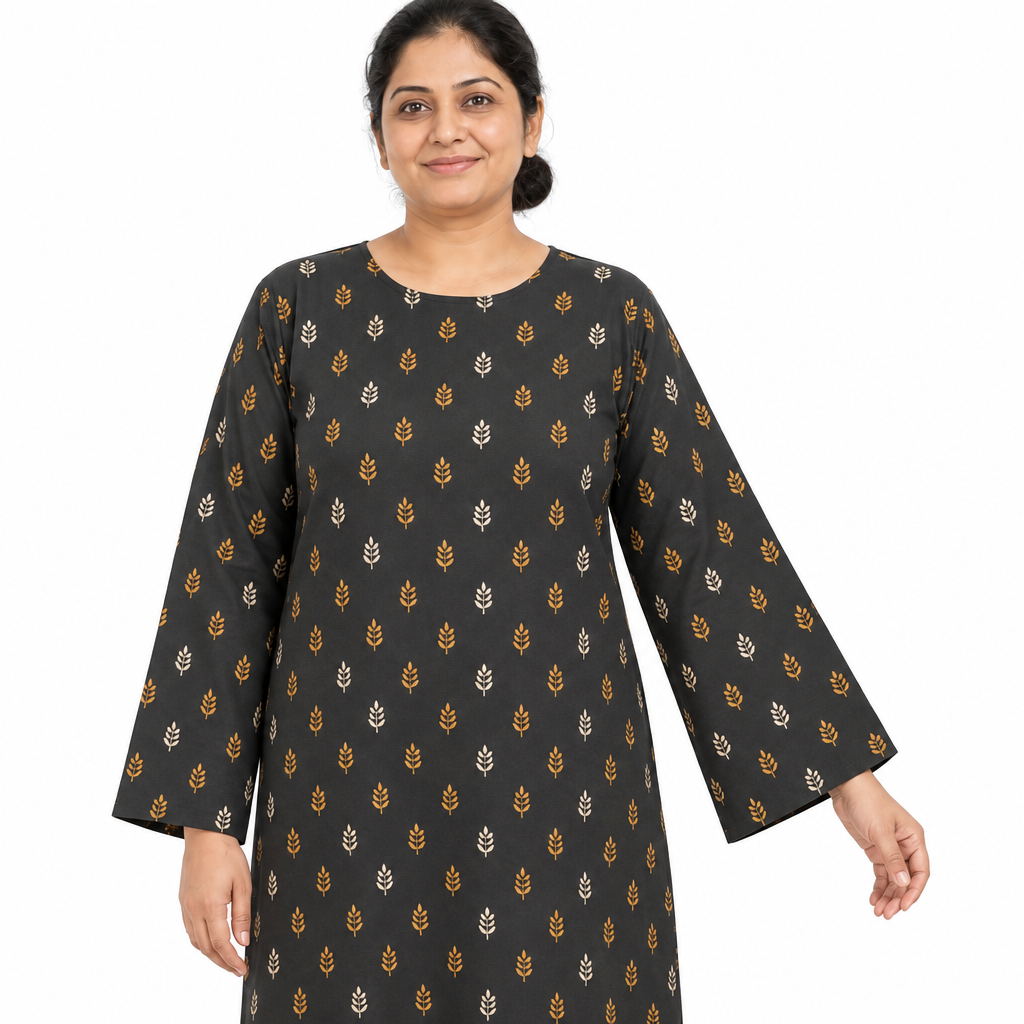 Close view of charcoal kaftan abaya showing the small ochre and ivory leaf print, modest round neckline and long sleeve