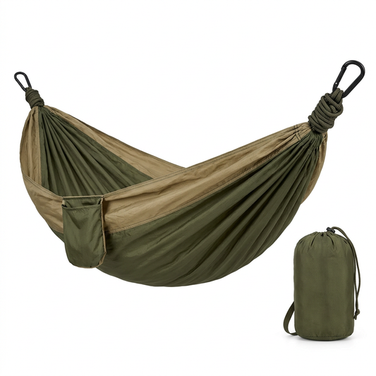 Camping parachute hammock in 210T nylon taffeta army green and khaki tan dual tone, showing open curved sling beside attached packed stuff sack on pure white background