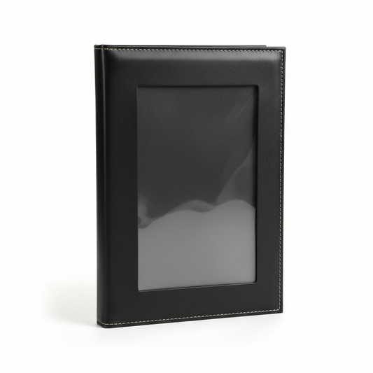 Classic A4 portrait black PU leather hotel restaurant menu holder with rigid spine two interior clear plastic pockets holding neutral white menu insert page standing upright on white background with stitched edge detail, commercial hospitality restaurant bar cafe banquet menu cover