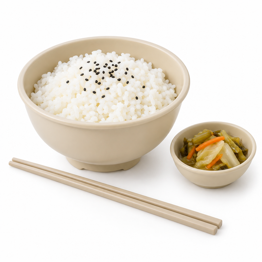 Round lightweight food-grade plastic rice bowl filled with steamed white rice, served with side dish and chopsticks on a seamless pure white background