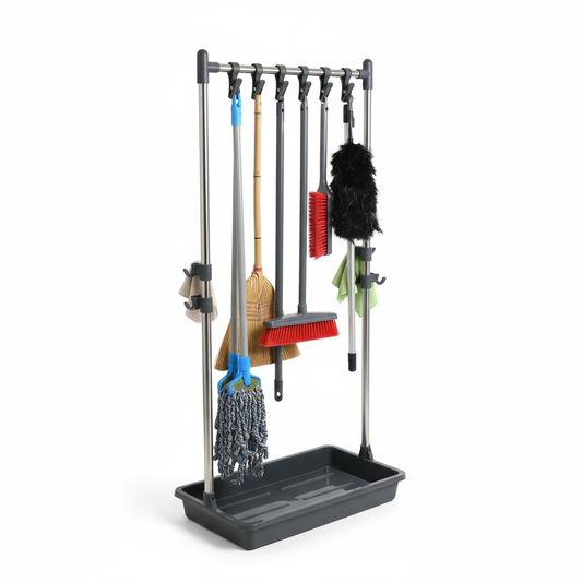 Freestanding hotel housekeeping storage rack organizing a mop, broom, brush, duster and telescopic handle with clips and hooks on white background