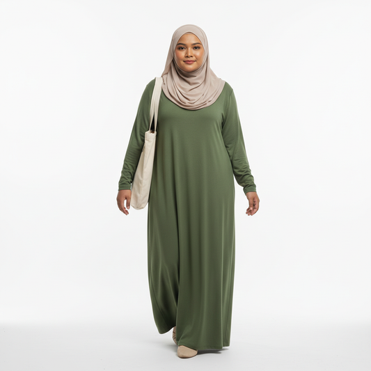 Malaysian Muslim woman olive modest dress walking