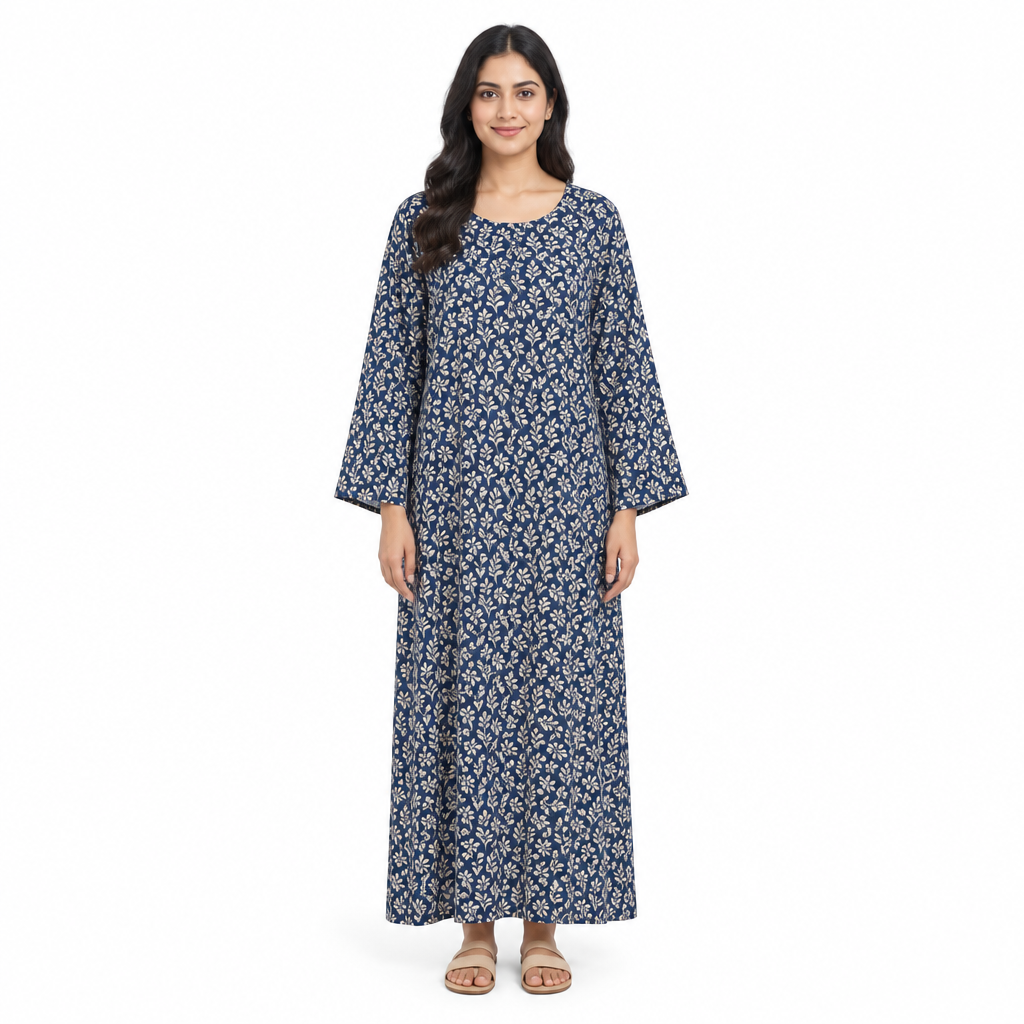 Model wearing a full-length navy printed long-sleeve kaftan dress, front view on a white background