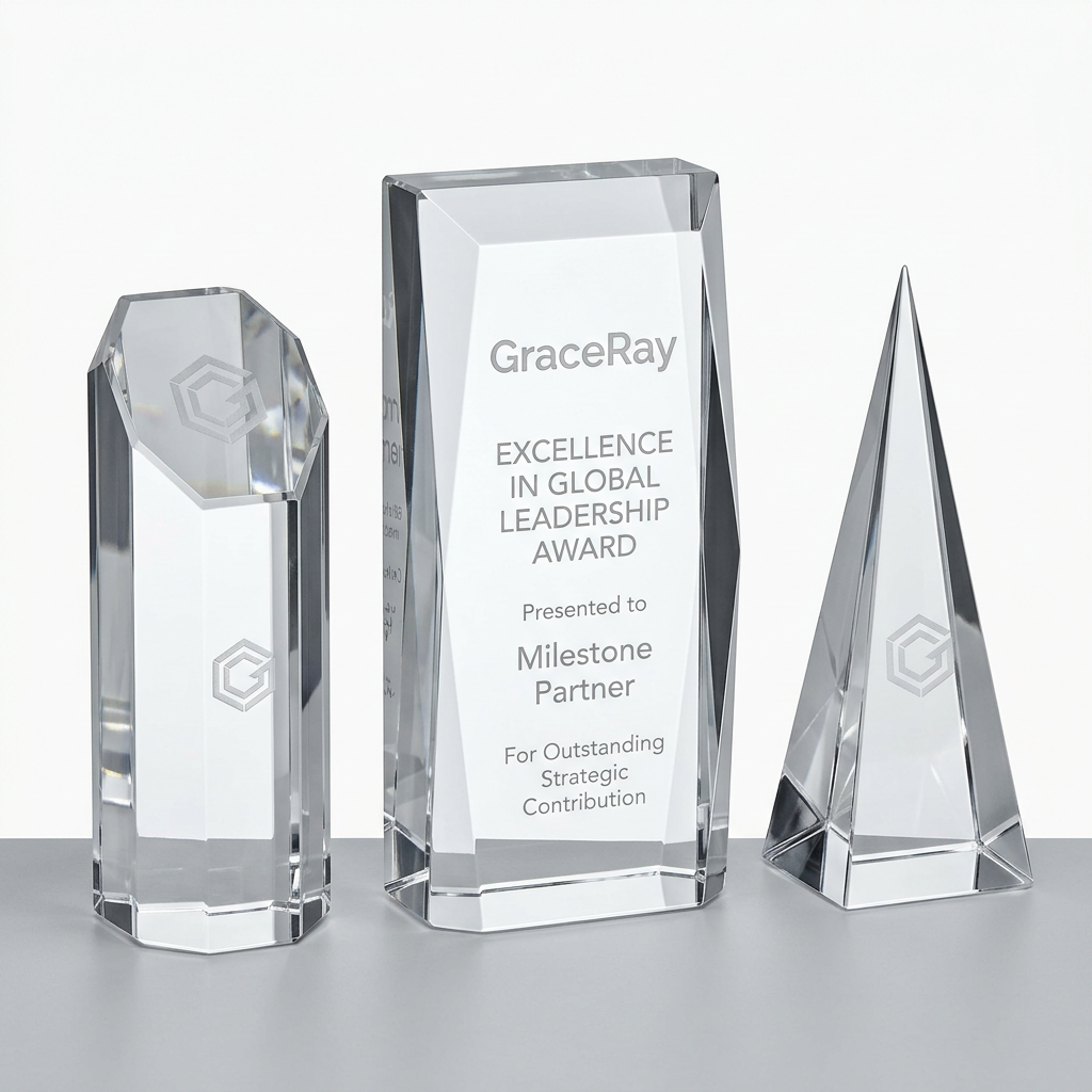 Custom engraved crystal awards with personalized text and logos for corporate recognition.