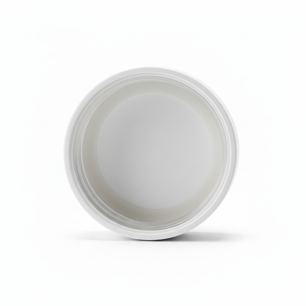 Macro view of white screw sealing lid interior with silicone gasket ring on pure white background