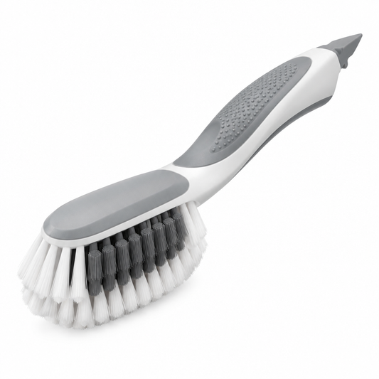 Ergonomic dual-stiffness shoe cleaning brush with non-slip handle grip on white background