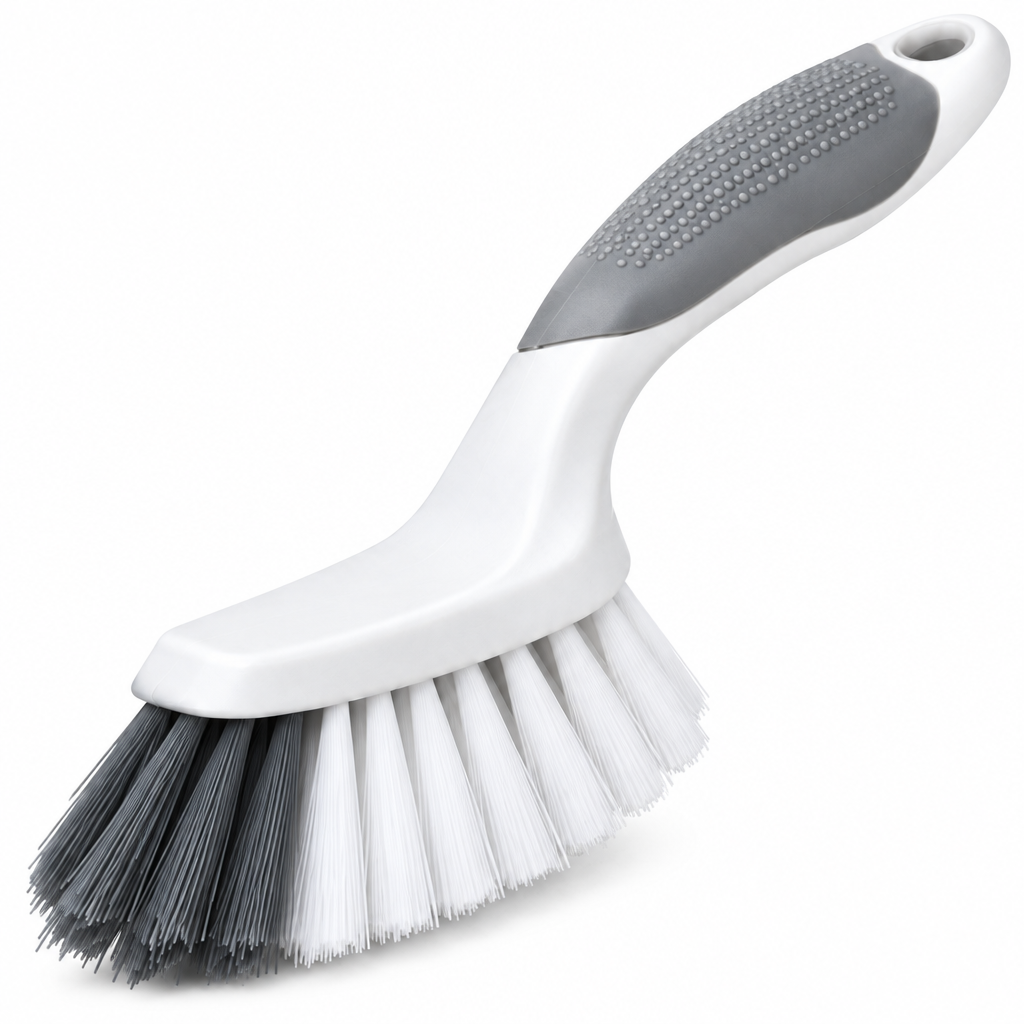 Close-up of the bathroom cleaning brush pointed bristle head and textured ergonomic grip handle