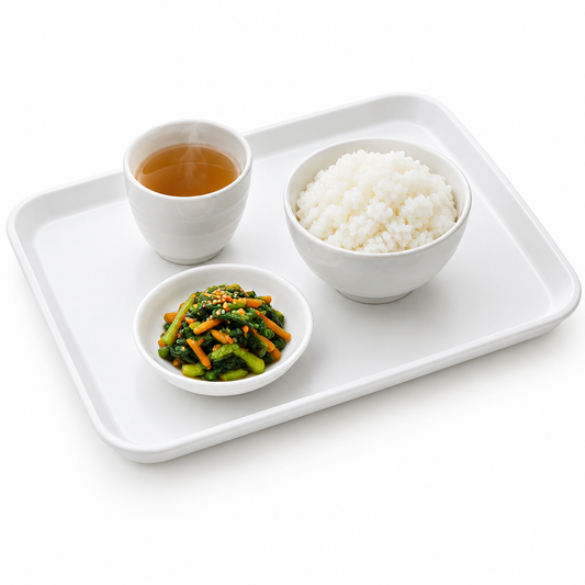 Rectangular white melamine serving tray carrying a teacup, rice bowl, and side dish with raised edges on a seamless pure white background
