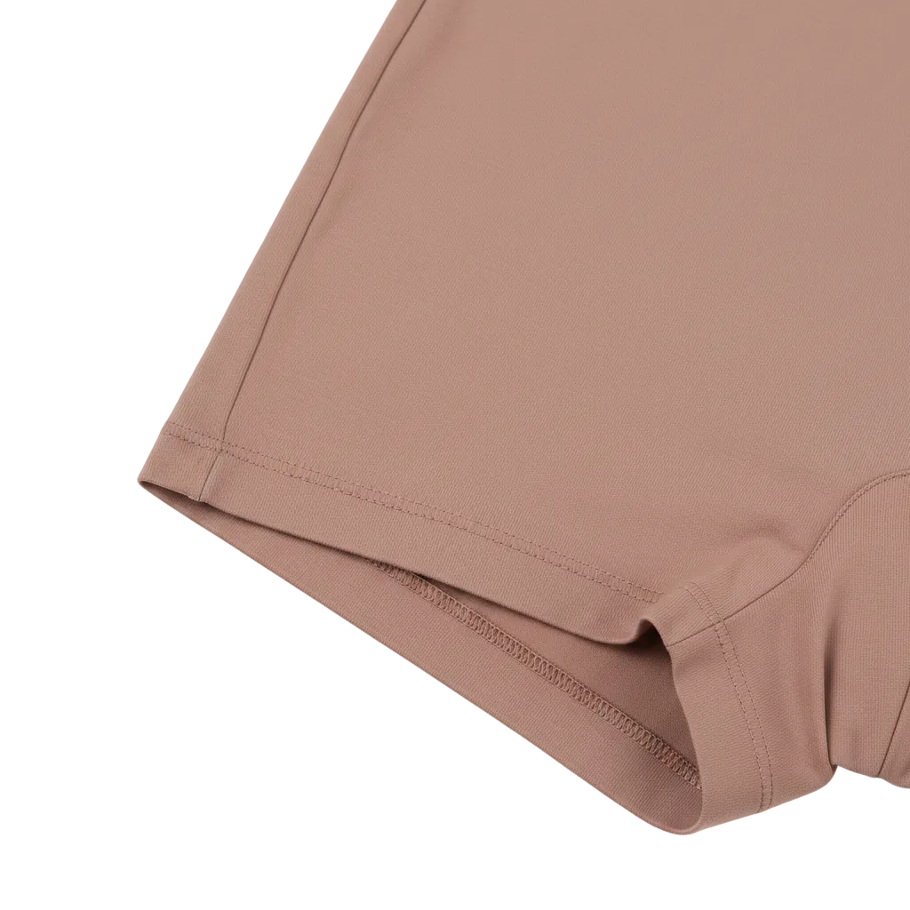 Extreme close-up of longer mid-thigh leg opening and smooth stretch fabric