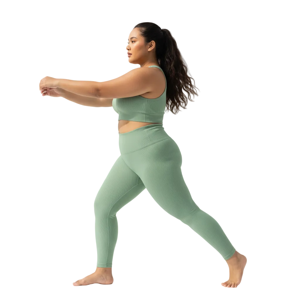 Indonesian model wearing sage green ribbed yoga leggings side view