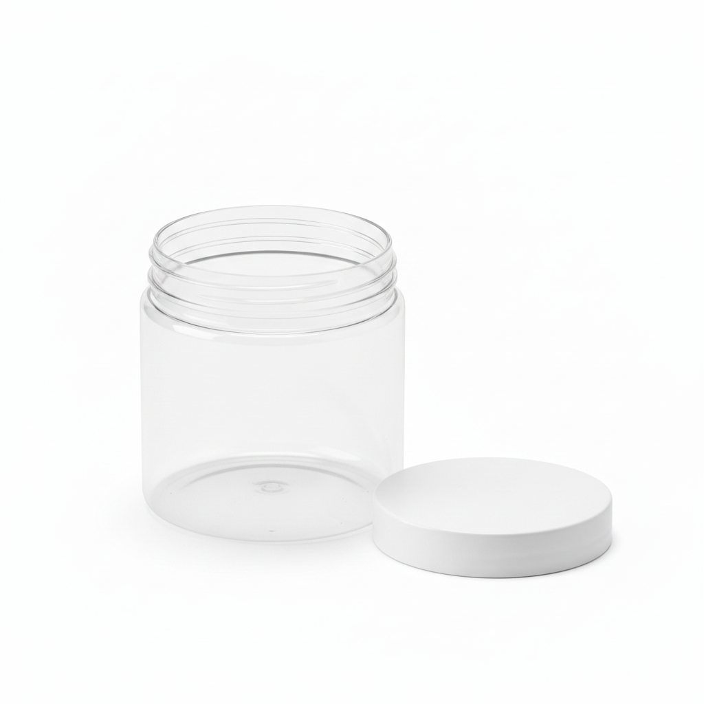 Round clear food storage jar open with white sealing lid resting beside it on pure white background