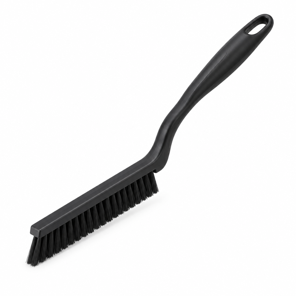 Corner cleaning brush with ultra-narrow flat head and stiff bristles on white background