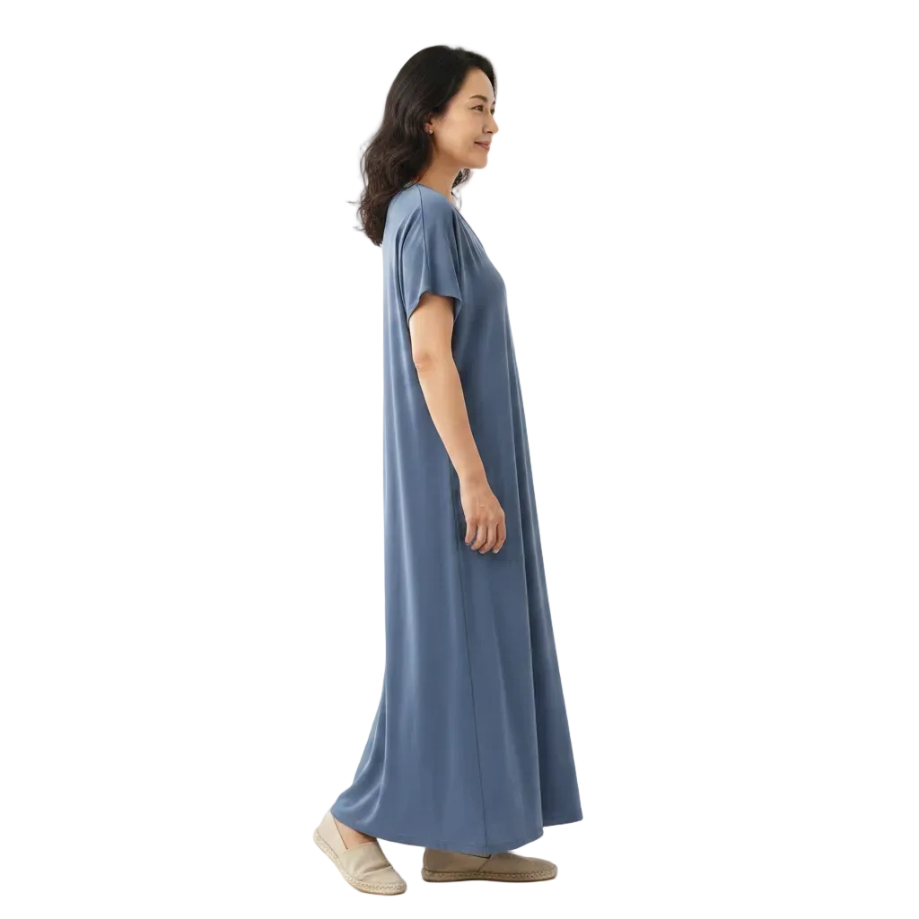 Side profile view of solid color V-neck relaxed maxi dress on white background