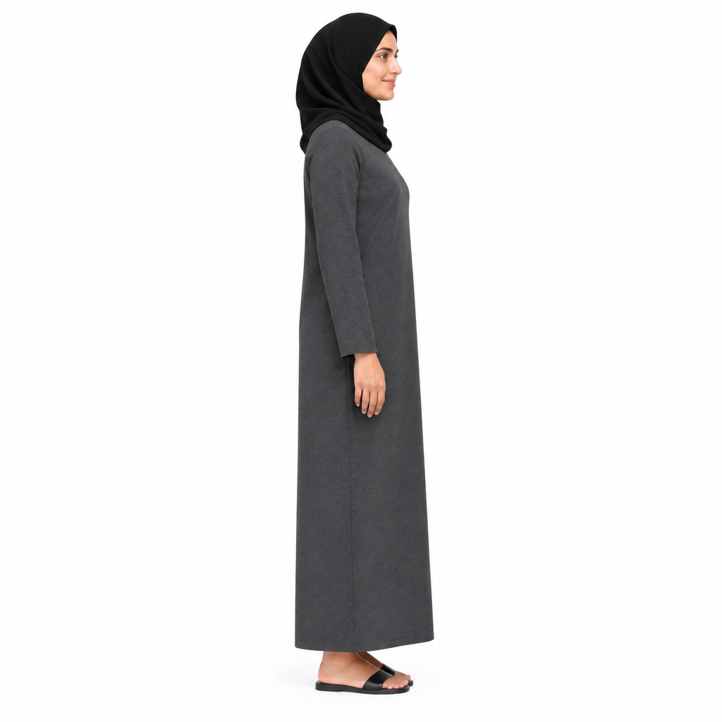 Side profile of a charcoal grey modest dress showing the relaxed straight ankle-length silhouette on white