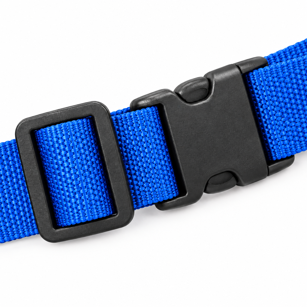 Close-up of the luggage strap black quick-release buckle, tri-glide slider, and woven webbing texture