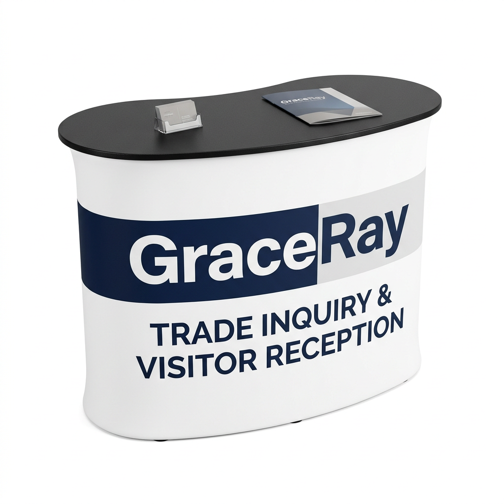 Portable exhibition display counter with a branded front panel in a trade show booth.