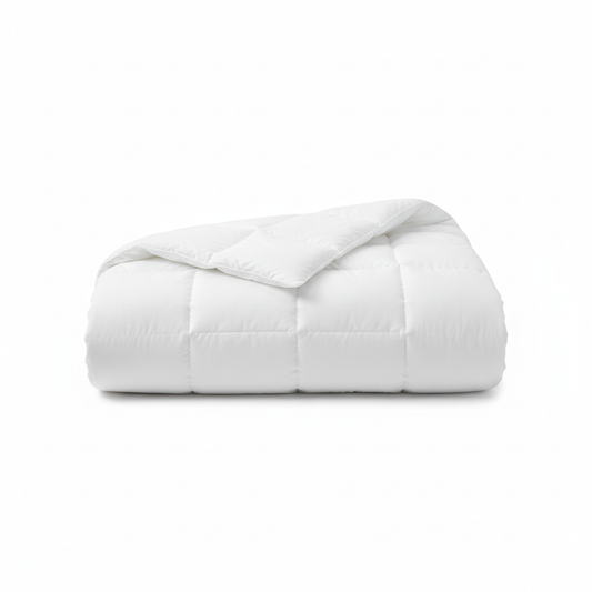 White medium-loft quilted hotel all-season duvet insert half-unfolded showing box-stitch quilting pattern and balanced loft profile on white background, versatile commercial hospitality guestroom bedding