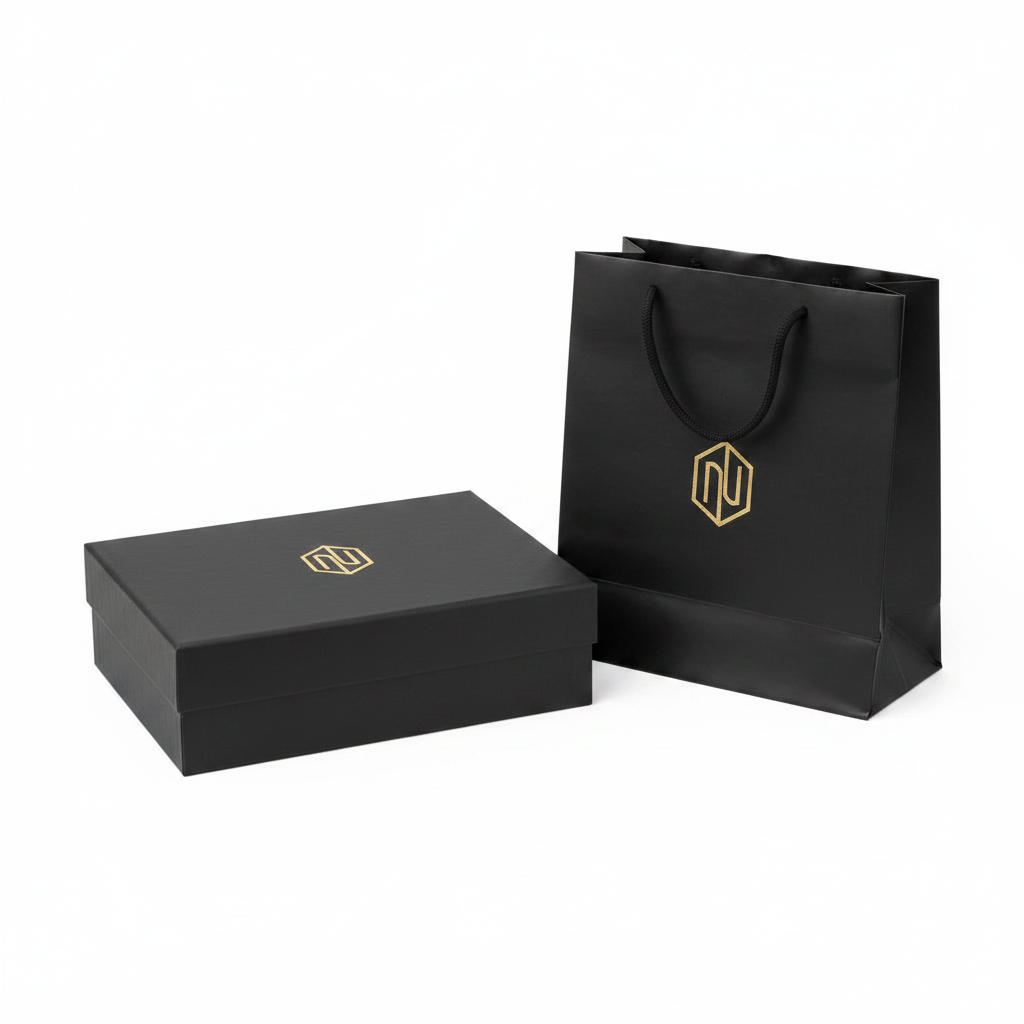 Closed rigid eyewear gift box with matching retail paper shopping bag on white background