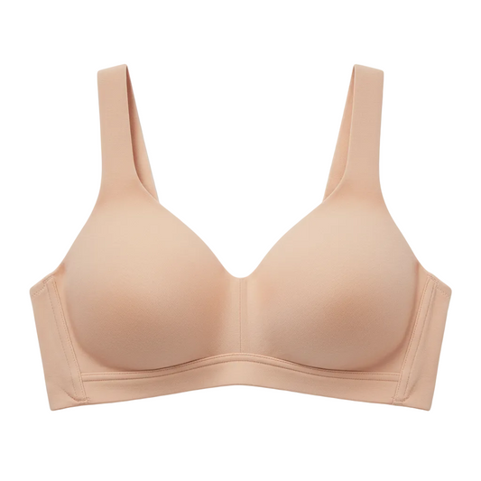 Front view of full-coverage wireless cotton bra in warm blush on white background
